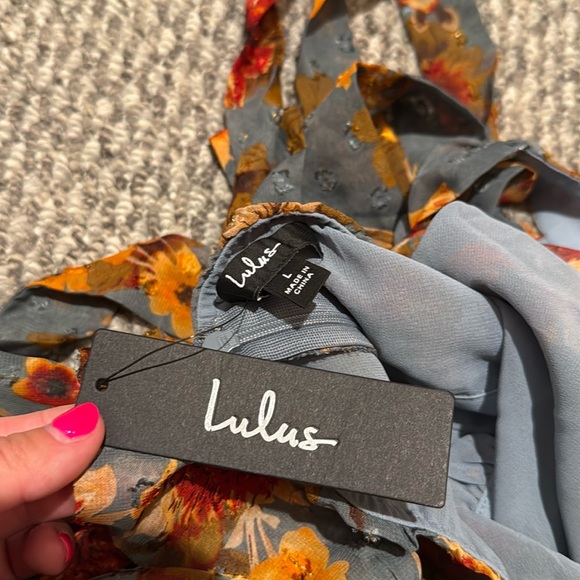 Charming Vision Blue Floral Swiss Dot Lurex
Halter Midi Dress - Lulu's - Picture 8 of 10